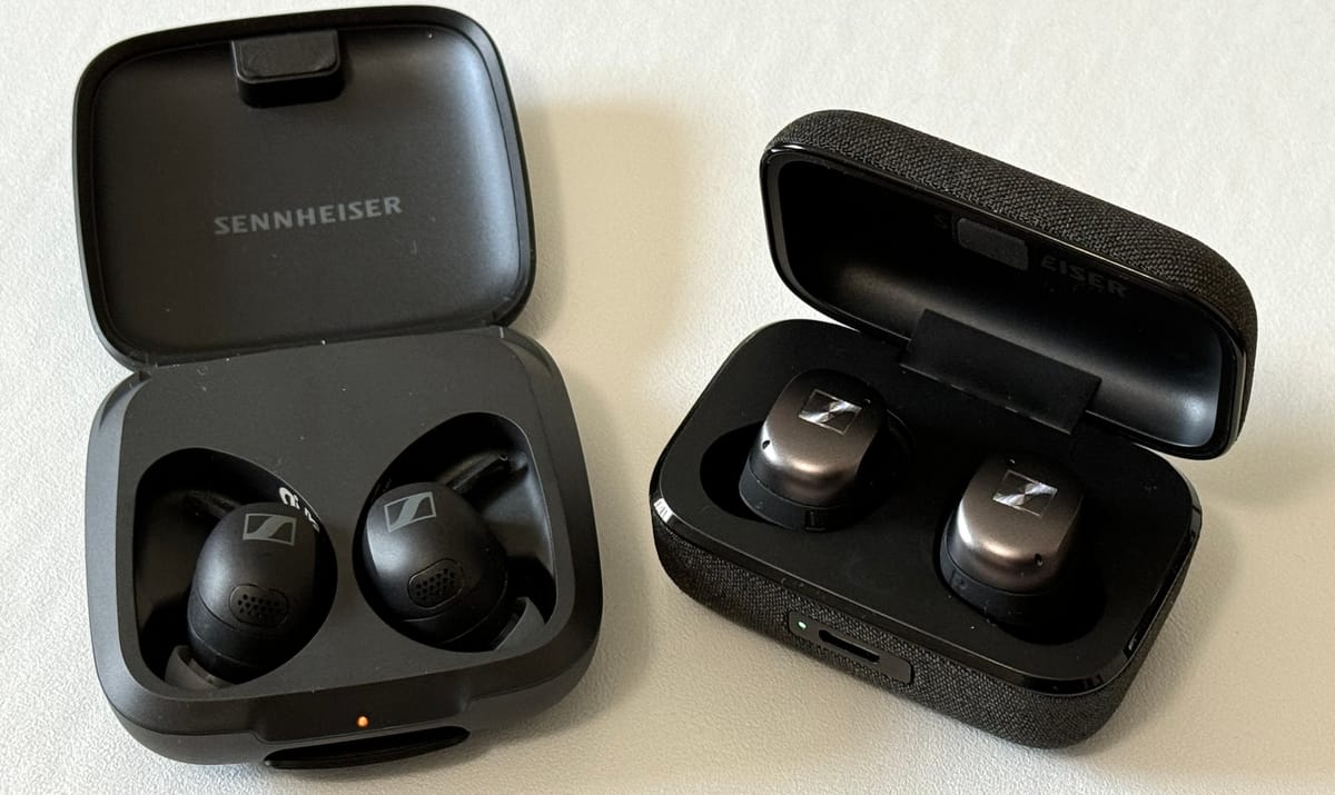 Two pairs of Sennheiser earbuds in cases for comparison.