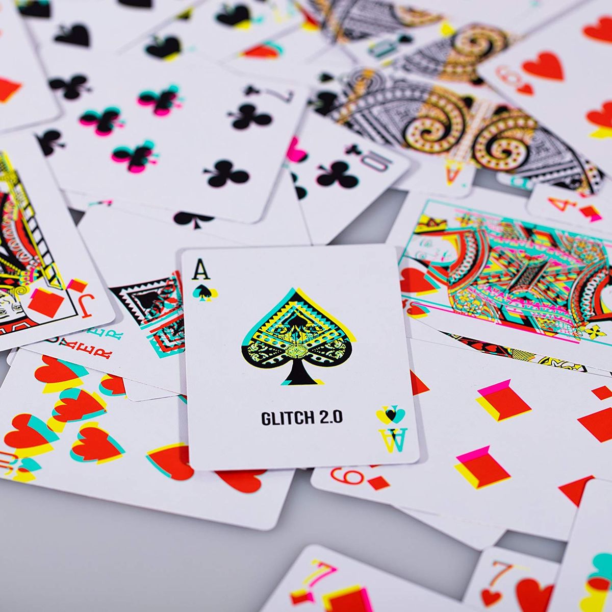 These Glitch art playing cards will give everyone a headache at your next poker night
