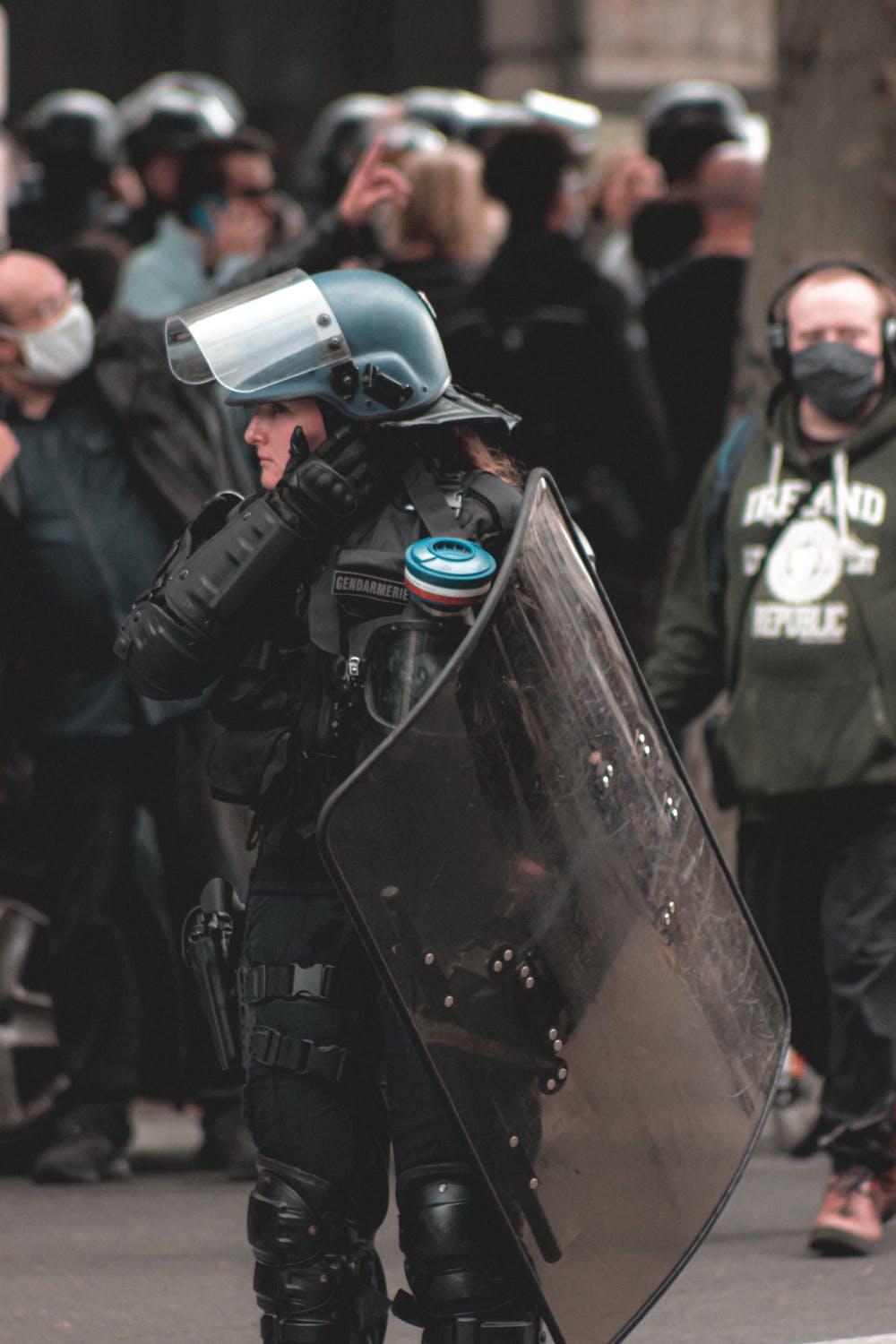 stock photo of a woman in riot police gear