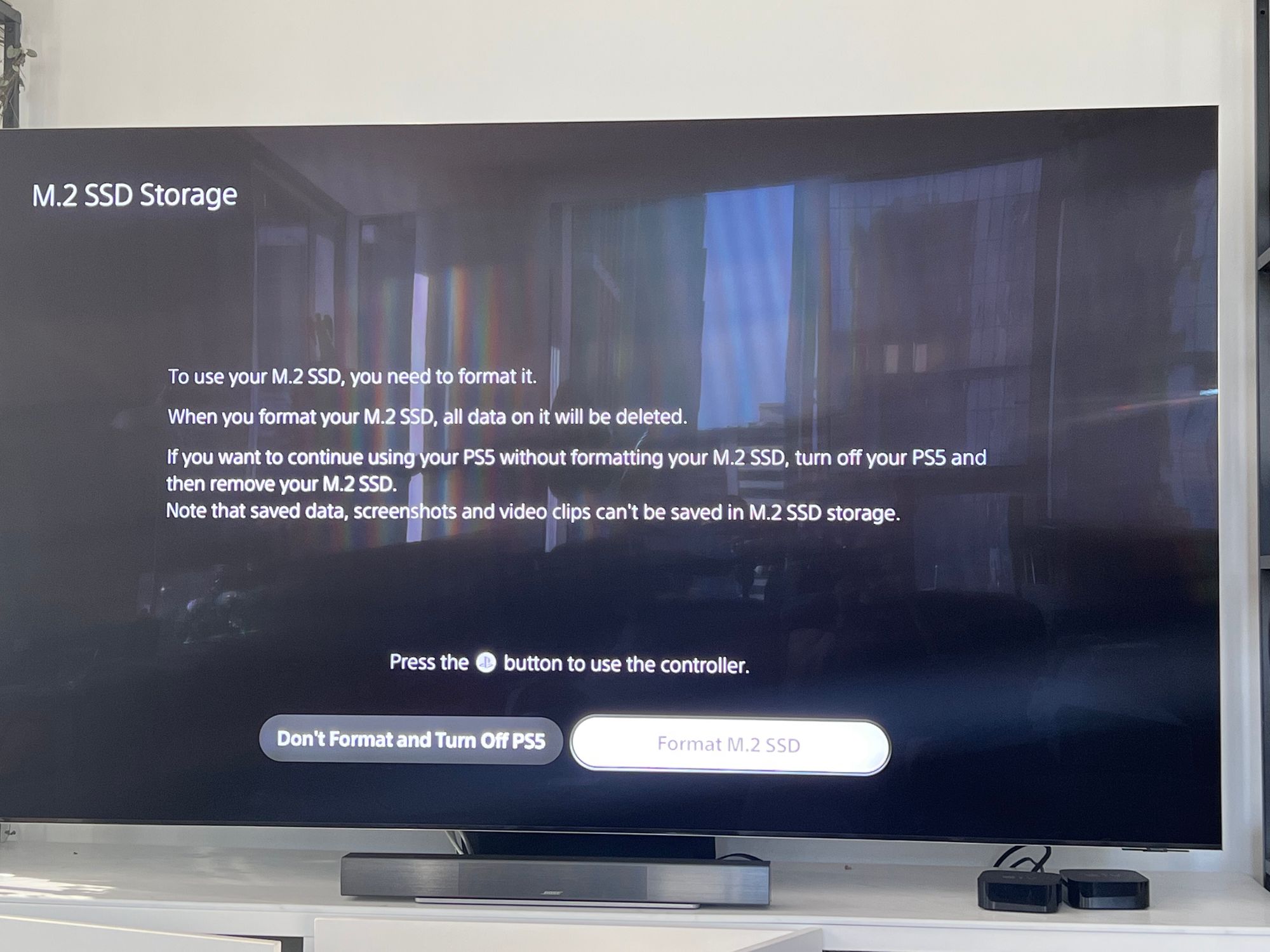 A picture of a TV with the M.2 SSD Storage notice asking if the user would like to format the drive, or not format it and just turn off the PS5.